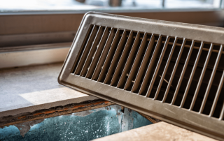 An air duct vent cover removed.